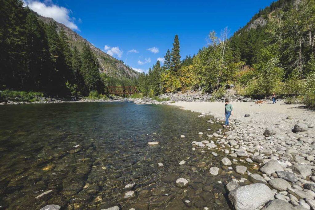 Woman on rocky beach near Old Pipeline Bed Hike near Leavenworth