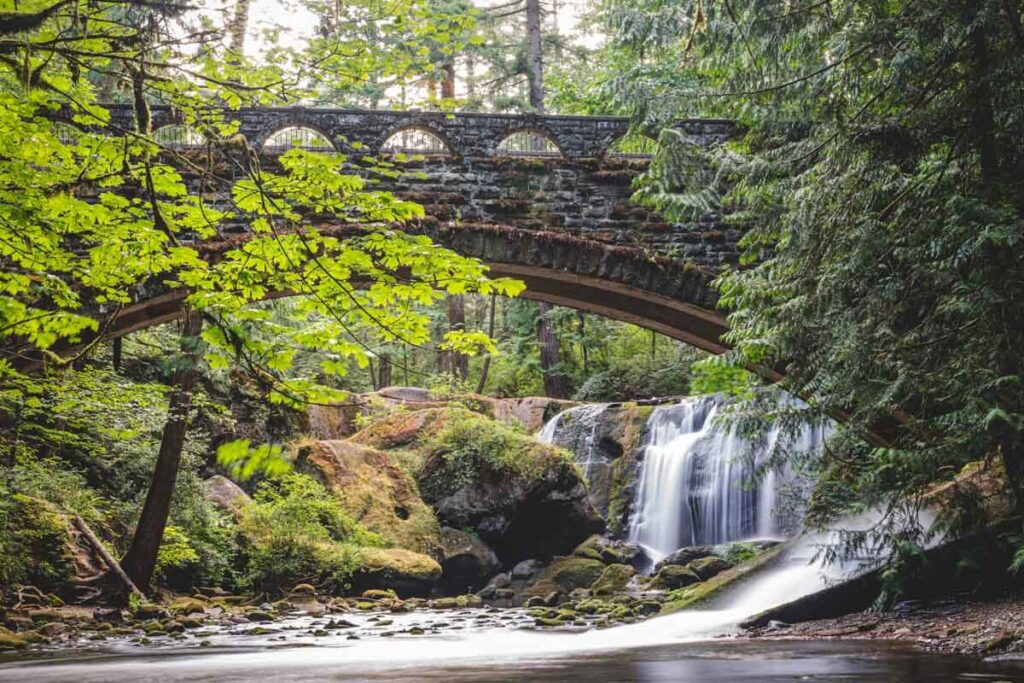 Bridge across Whatcom Falls near Bellingham is one of the best day trips from Seattle