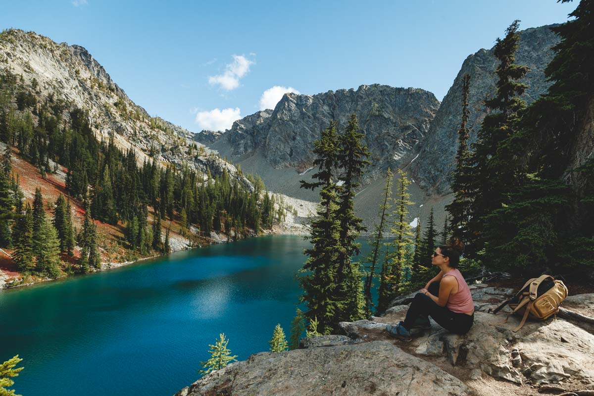 Hiker at Blue Lake on the best hikes in North Cascades National Park