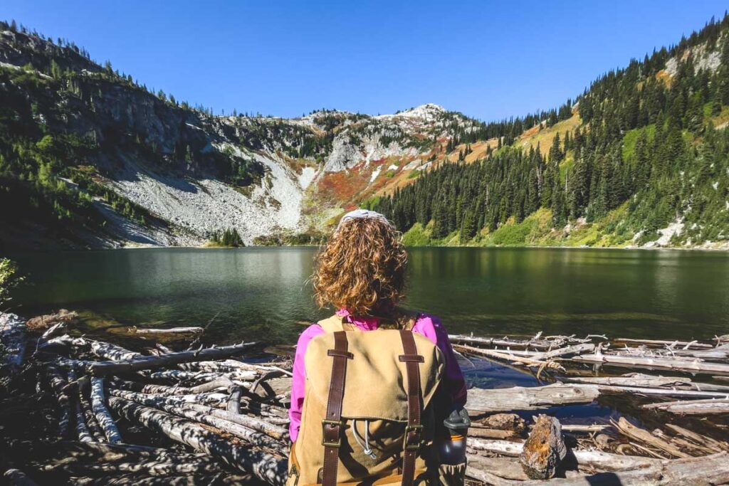 Hiker at Lake Ann off the Maple Pass Loop