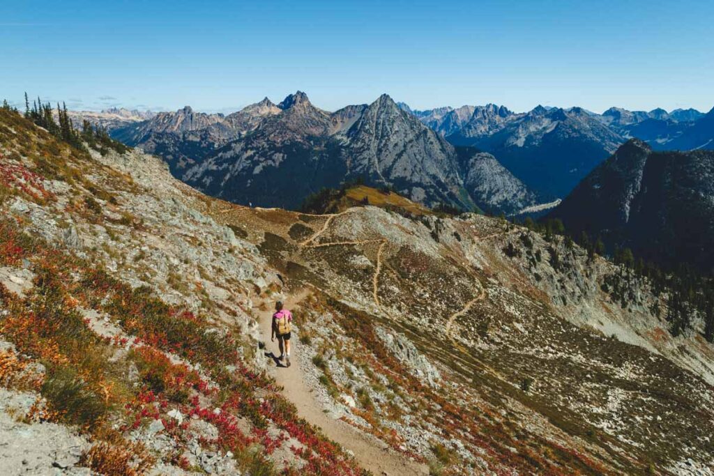 Hiker on the descent of the Maple Pass Trail