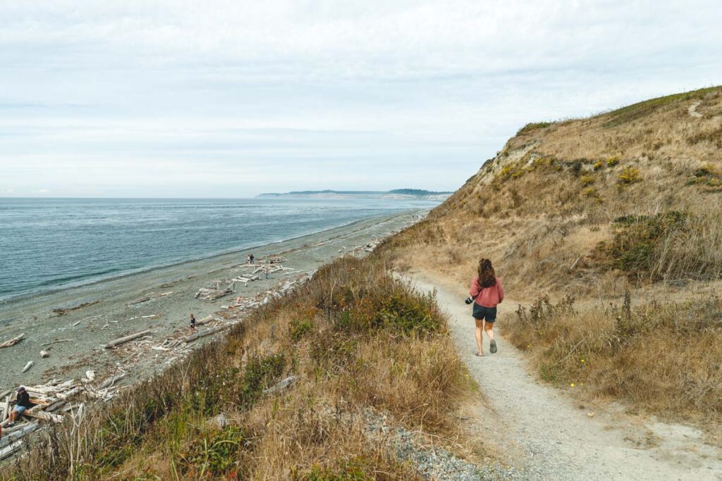 Hiker on beach trail at Fort Casey State Park