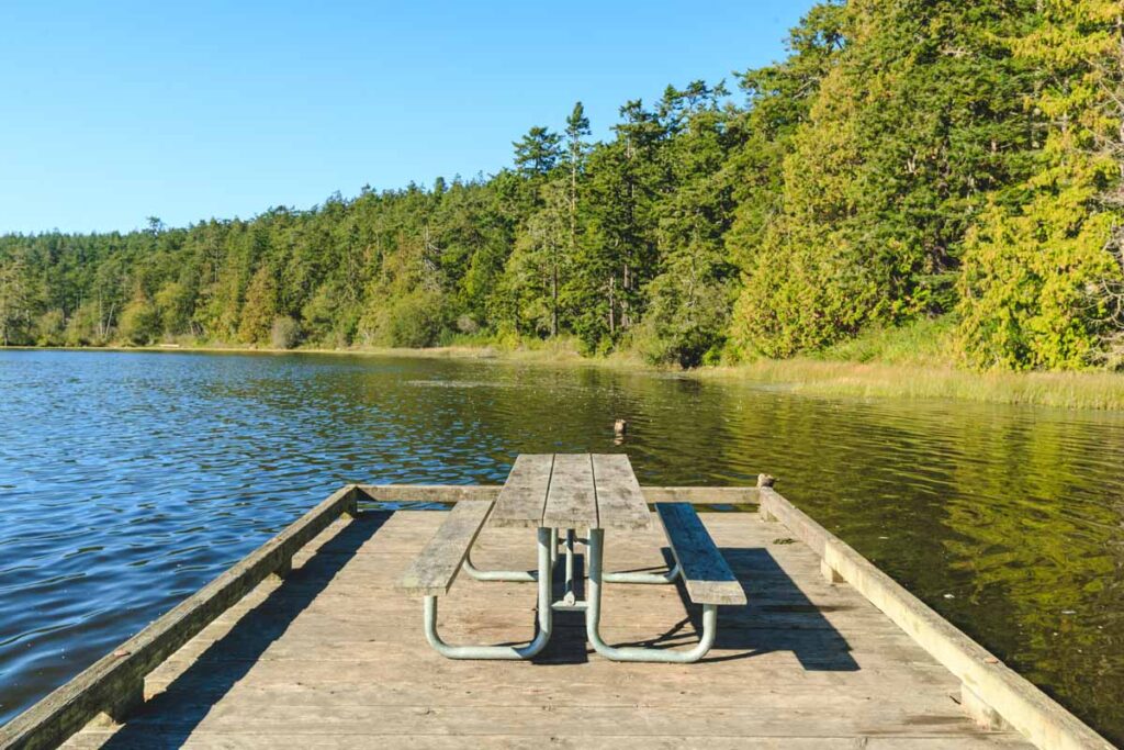 Picnic table near lake Deception Pass camping