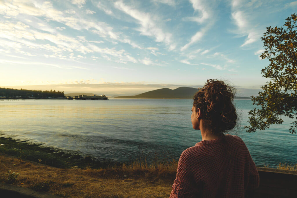 Woman on Guemes Channel Trail things to do near Whidbey Island