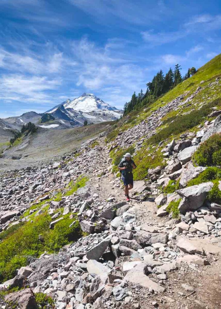 Hiker on the Chain Lakes Loop near the best lakes in Washington