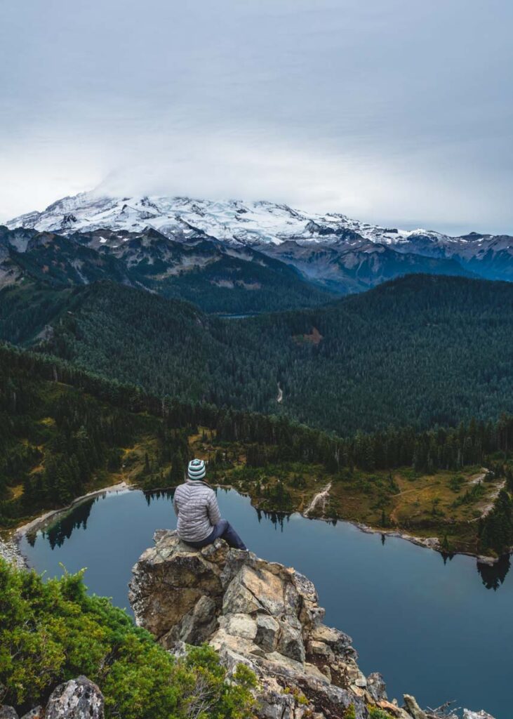 Woman overlooking Eunice Lake on Tolmie Peak Lookout Trail best lakes in Washington