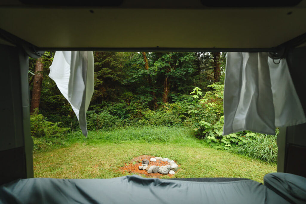 View of firepit from campervan at Lake Quinault