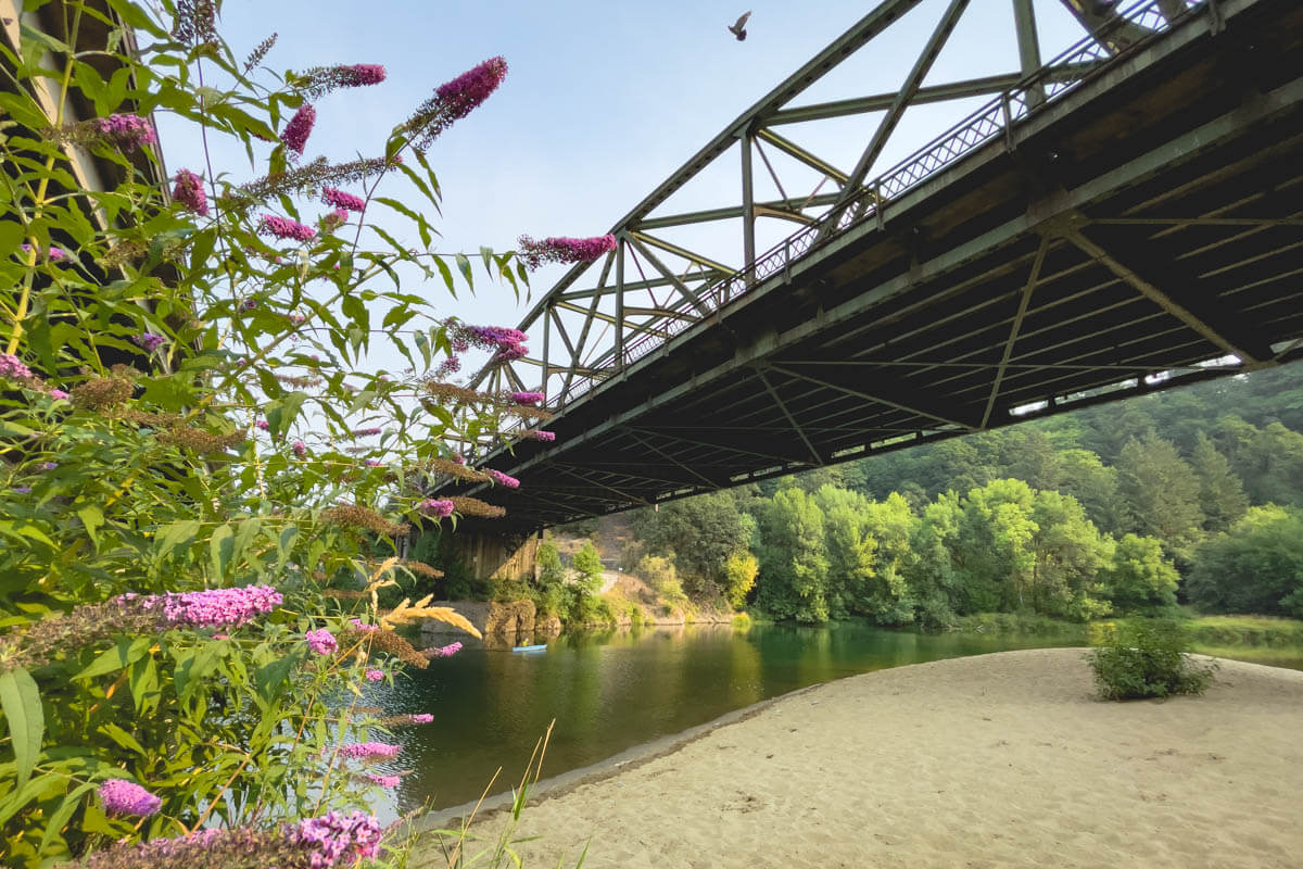 Kayaker under a bridge at Paradise Point State Park