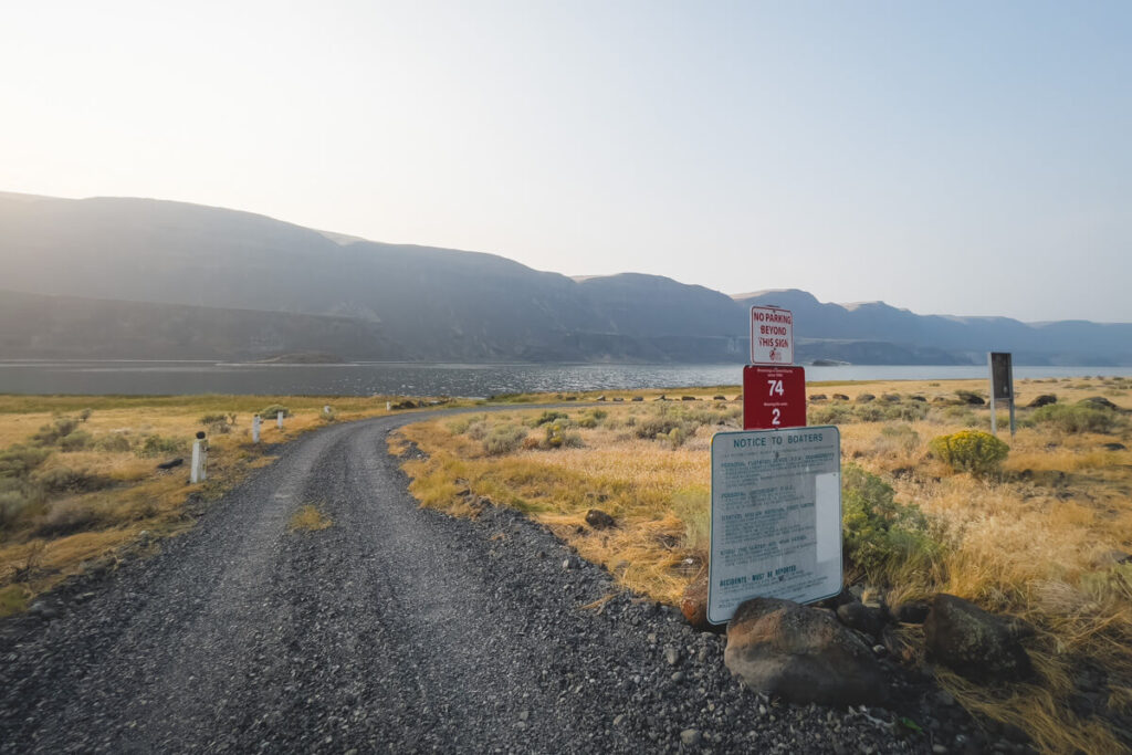 A boaters notice sign at the end of an access road to Lake Lenore.