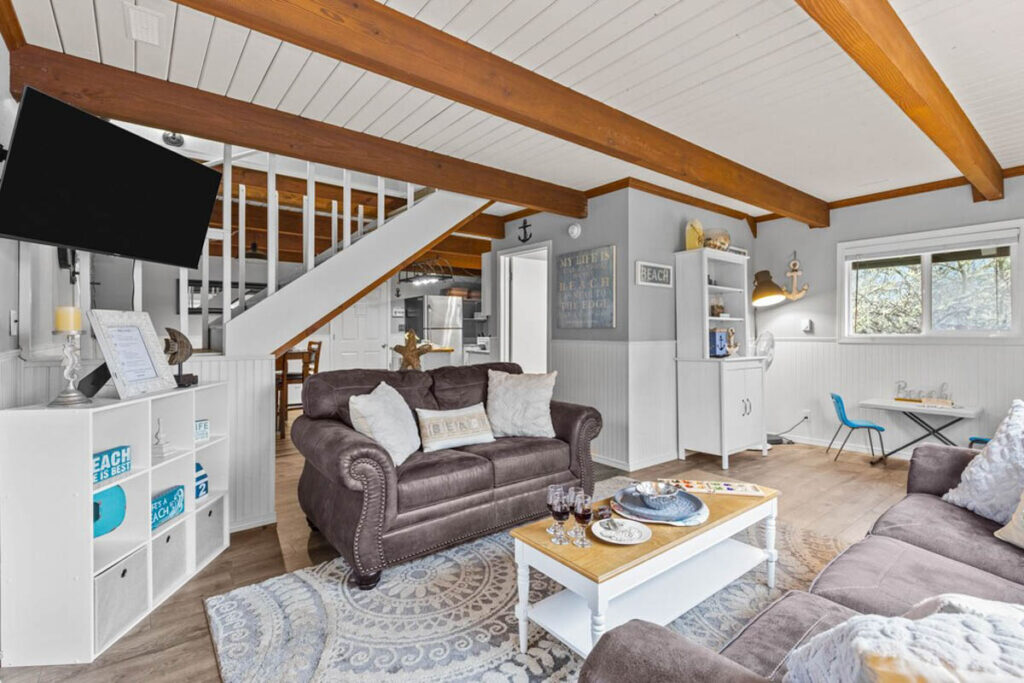 A beautifully monochrome designed living room inside the Coastal Cottage.
