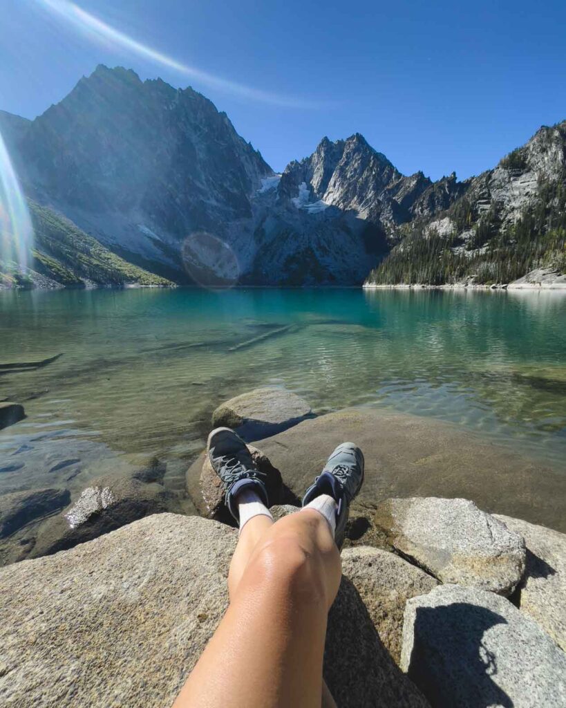 Nina relaxing lakeside in the Enchantments in Washington.