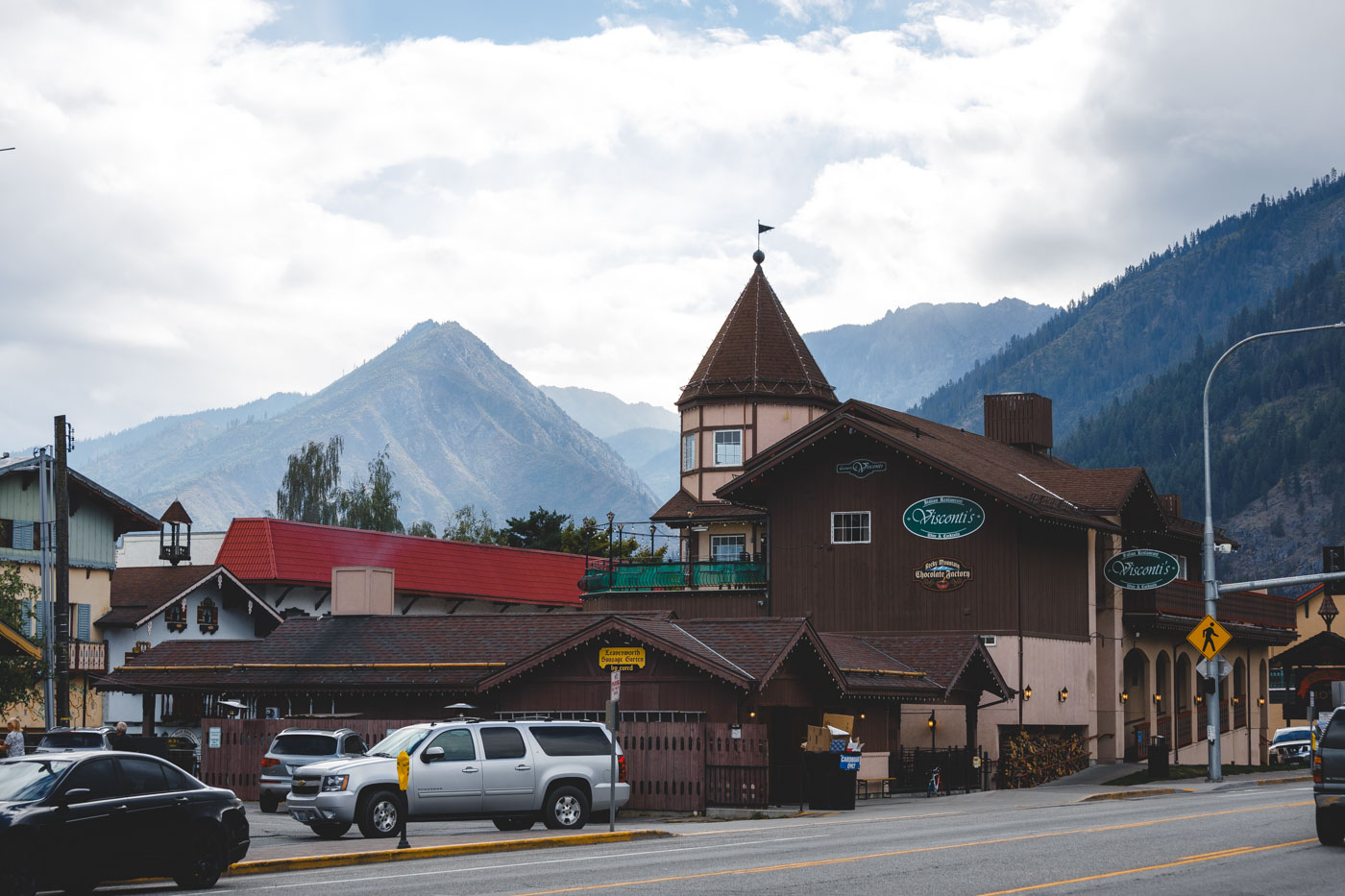 German-style buildings in downtown Leavenworth with mountains in the distance.