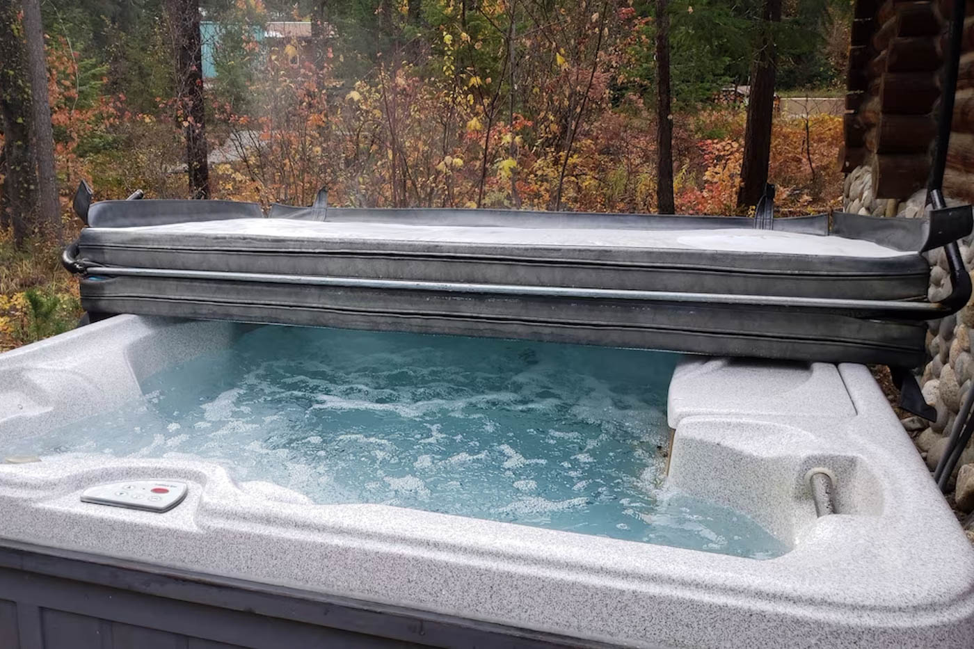 Half covered hot tub of the Trout Shack.